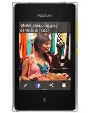 Мобільні телефони Nokia Asha 502 Dual SIM фото